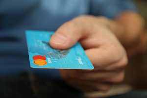 Person paying with credit card