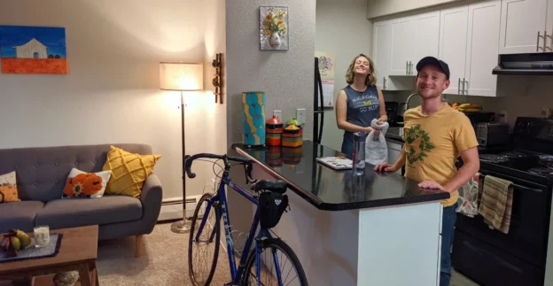 Happy couple in apartment rental