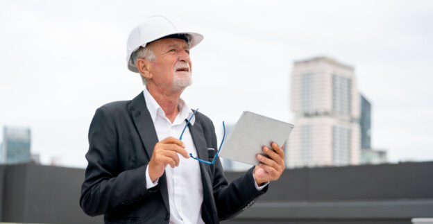 Man checking maintenance of building