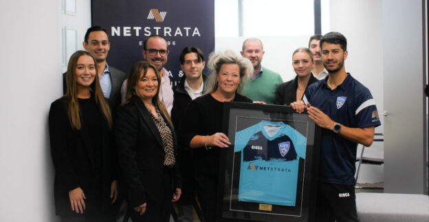 Netstrata Wollongong team with new SJFC sponsorship shirt
